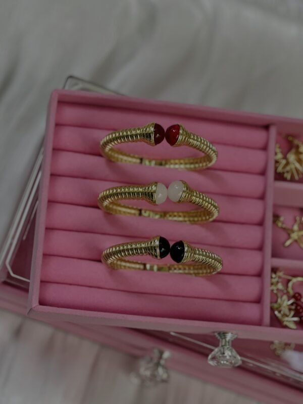 Himo stainless steel bangles in gold by Favora Lebanon