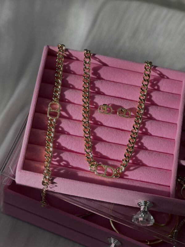 Gold CD necklace, bracelet, and earrings stainless steel set by Favora