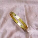 Elysian Inscribed Gold Hinged Bangle