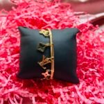 The Louis Charms Twist Bangle