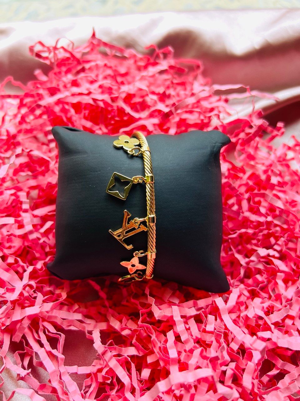 photo_5776140232238502181_y The Louis Charms Twist Bangle - Image 1